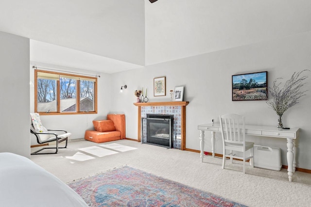 3311 S Scarlet Oak Ln, Appleton, WI 54915 - living room featuring carpet floors, baseboards, a tile fireplace, and a towering ceiling