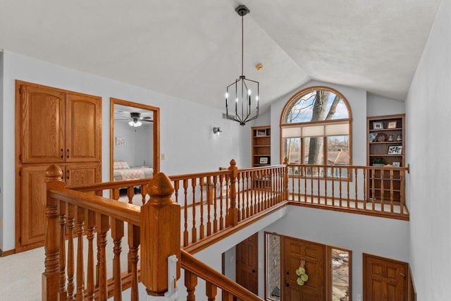 3311 S Scarlet Oak Ln, Appleton, WI 54915 - corridor featuring an upstairs landing, lofted ceiling, and a chandelier
