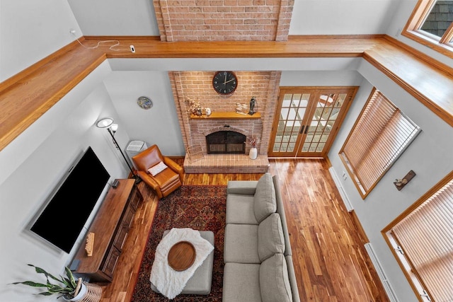 3311 S Scarlet Oak Ln, Appleton, WI 54915 - living area with a brick fireplace and wood finished floors