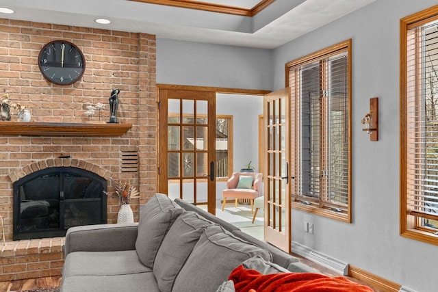 3311 S Scarlet Oak Ln, Appleton, WI 54915 - living area with a brick fireplace, baseboards, plenty of natural light, french doors, and recessed lighting