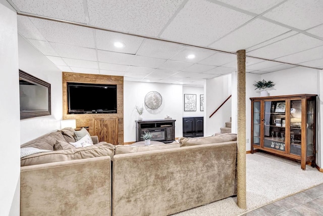 living room featuring stairway, a paneled ceiling, recessed lighting, and carpet flooring