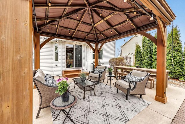 view of patio with a gazebo and an outdoor hangout area