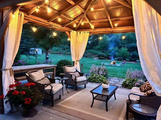 view of patio with a gazebo and outdoor lounge area