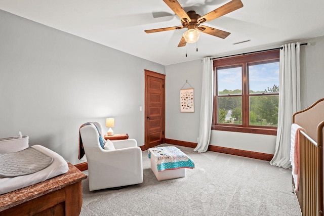 1753 Oneida Ct, Grafton, WI 53024 - living area with carpet flooring, baseboards, and a ceiling fan