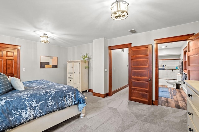 1753 Oneida Ct, Grafton, WI 53024 - bedroom featuring light colored carpet and baseboards