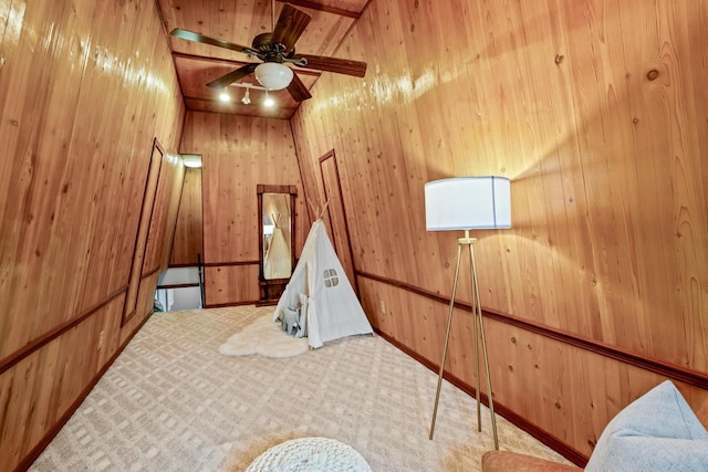 1753 Oneida Ct, Grafton, WI 53024 - rec room with wood walls, carpet, and a ceiling fan
