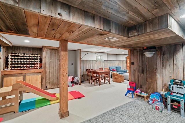 1753 Oneida Ct, Grafton, WI 53024 - recreation room with carpet floors, wood walls, and wooden ceiling