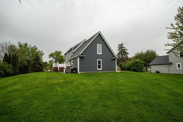 1753 Oneida Ct, Grafton, WI 53024 - back of house with a lawn
