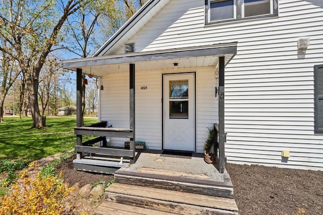 4121 1st Ave, Briggsville, WI 53920 - entrance to property featuring covered porch and a lawn