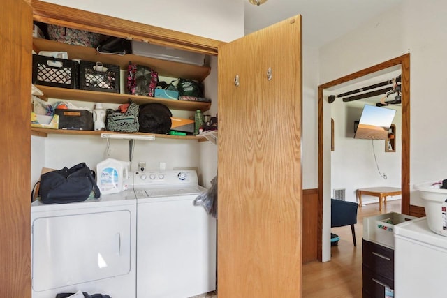 4121 1st Ave, Briggsville, WI 53920 - laundry area with separate washer and dryer and light wood finished floors