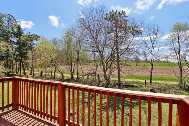 4121 1st Ave, Briggsville, WI 53920 - wooden deck featuring a lawn