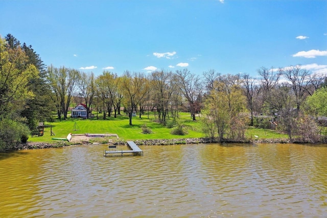 4121 1st Ave, Briggsville, WI 53920 - water view with a dock and a tree filled landscape