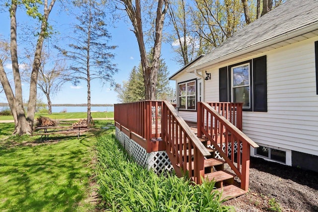 4121 1st Ave, Briggsville, WI 53920 - wooden terrace featuring a water view and a yard