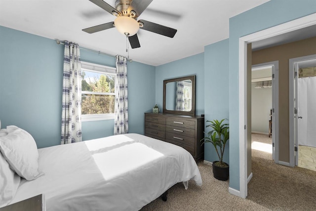 5719 Highland Way, Middleton, WI 53562 - bedroom with carpet, a ceiling fan, and baseboards