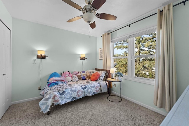 5719 Highland Way, Middleton, WI 53562 - carpeted bedroom with baseboards, a ceiling fan, and a closet