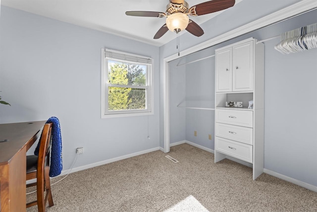 5719 Highland Way, Middleton, WI 53562 - unfurnished bedroom with light colored carpet, baseboards, and a ceiling fan