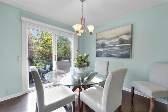 5719 Highland Way, Middleton, WI 53562 - dining area featuring a chandelier, baseboards, and wood finished floors