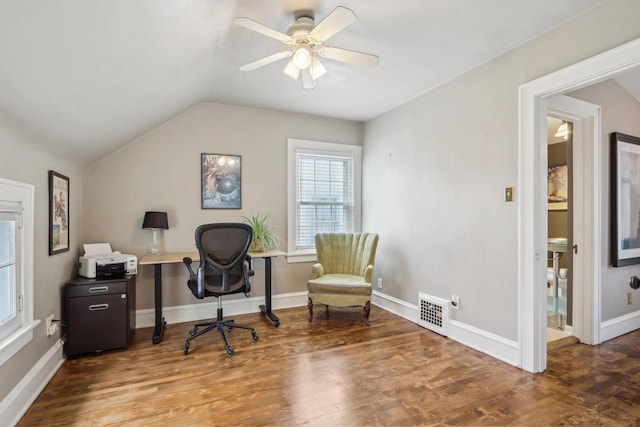 office with lofted ceiling, a ceiling fan, wood finished floors, and baseboards
