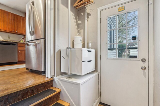 entryway featuring stairs