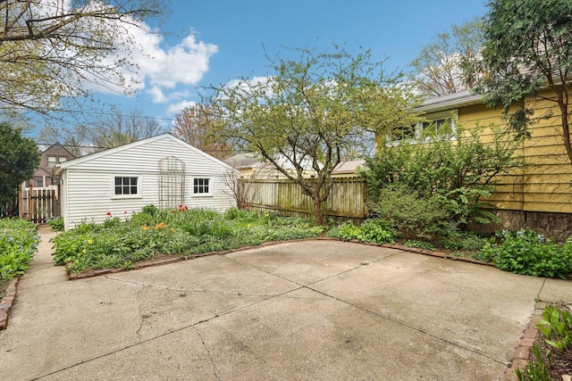 view of patio featuring fence
