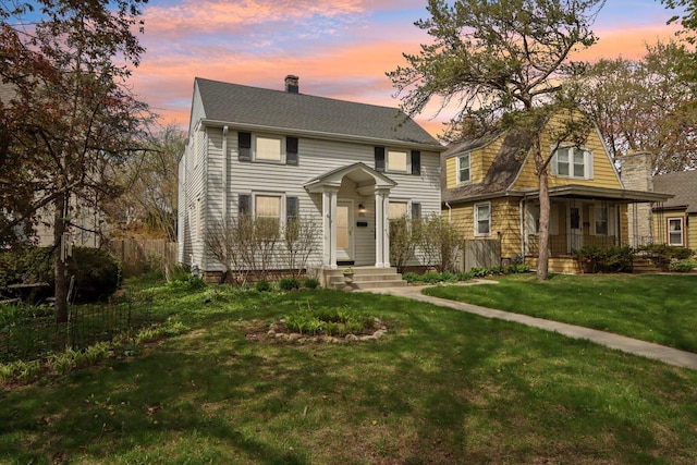 colonial inspired home with a chimney