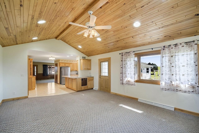 7704 Salisbury Rd, West Bend, WI 53090 - unfurnished living room featuring baseboards, recessed lighting, a ceiling fan, a baseboard radiator, and light colored carpet