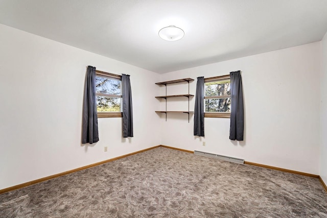 7704 Salisbury Rd, West Bend, WI 53090 - unfurnished room with carpet flooring, a baseboard heating unit, plenty of natural light, and baseboards