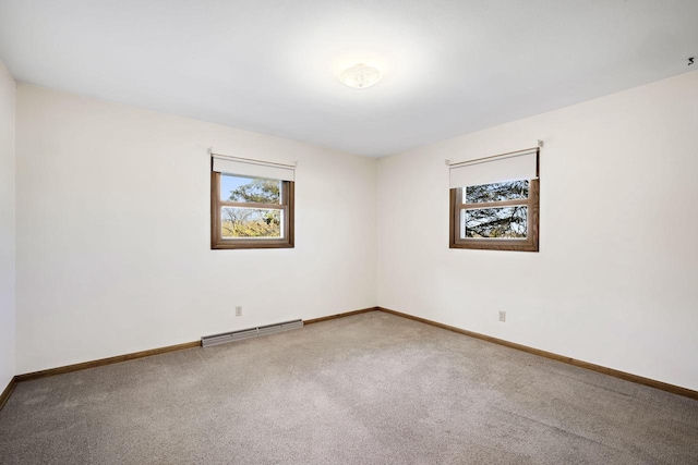 7704 Salisbury Rd, West Bend, WI 53090 - carpeted spare room with baseboards