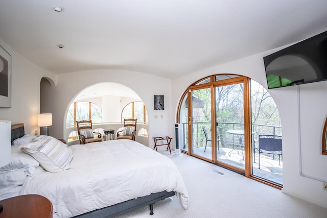 4455 Club Dr, Slinger, WI 53086 - bedroom featuring access to outside and light colored carpet