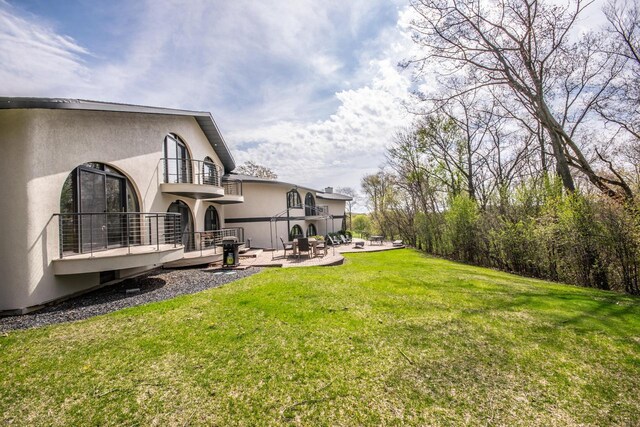 4455 Club Dr, Slinger, WI 53086 - view of grassy yard with a patio and a balcony