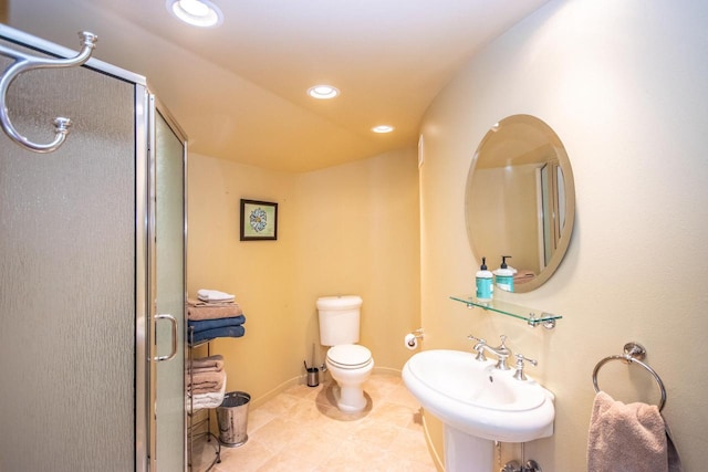 4455 Club Dr, Slinger, WI 53086 - full bathroom with a shower stall, a sink, toilet, tile patterned floors, and recessed lighting