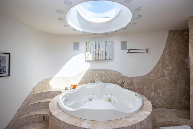 4455 Club Dr, Slinger, WI 53086 - full bathroom featuring a jetted tub