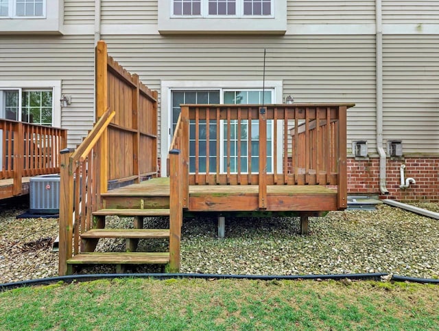 wooden terrace with central AC unit and stairway