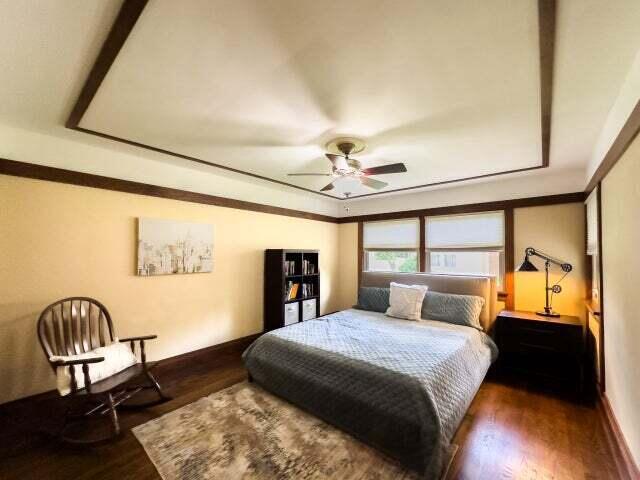 7814 2nd Ave, Kenosha, WI 53143 - bedroom featuring wood finished floors and baseboards