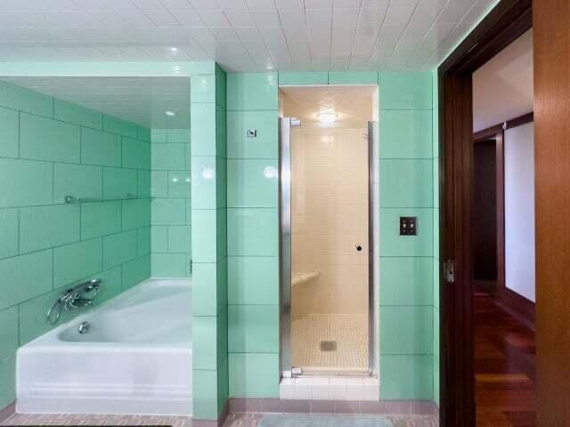 7814 2nd Ave, Kenosha, WI 53143 - full bathroom featuring a shower stall and a bath