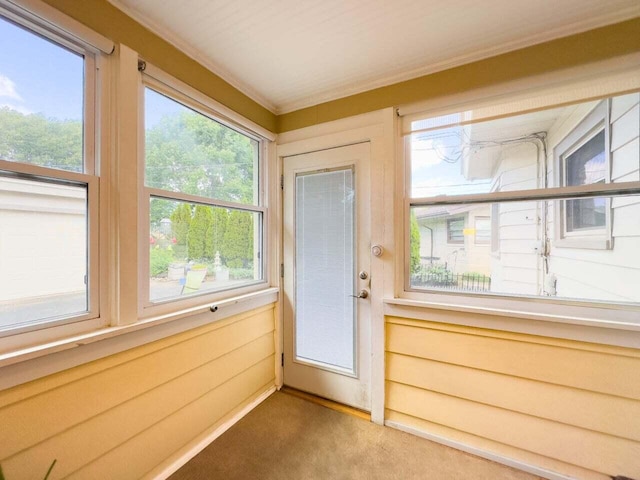 7814 2nd Ave, Kenosha, WI 53143 - unfurnished sunroom featuring carpet flooring