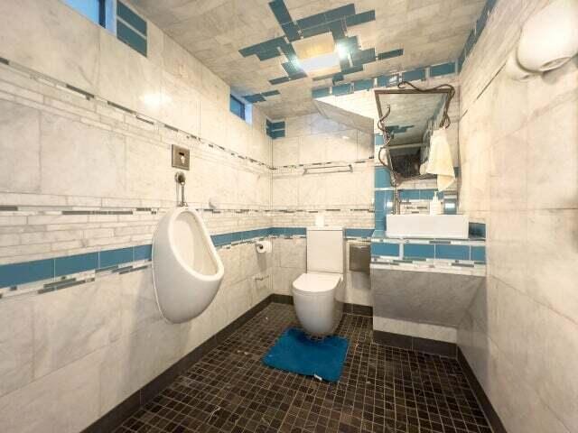 7814 2nd Ave, Kenosha, WI 53143 - bathroom with tile walls and toilet