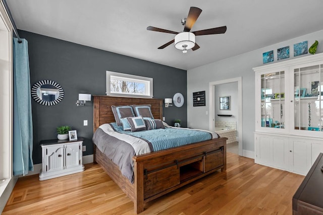 519 Park Ave, Little Chute, WI 54140 - bedroom featuring light wood-type flooring and baseboards