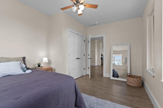 519 Park Ave, Little Chute, WI 54140 - bedroom with wood finished floors, baseboards, and ceiling fan