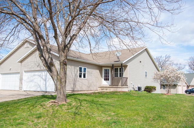 624 Westwynd Ct, Mazomanie, WI 53560 - view of front facade with a garage, driveway, central AC unit, and a front yard