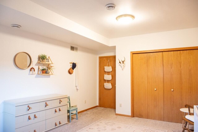 624 Westwynd Ct, Mazomanie, WI 53560 - bedroom with light carpet, a closet, and baseboards