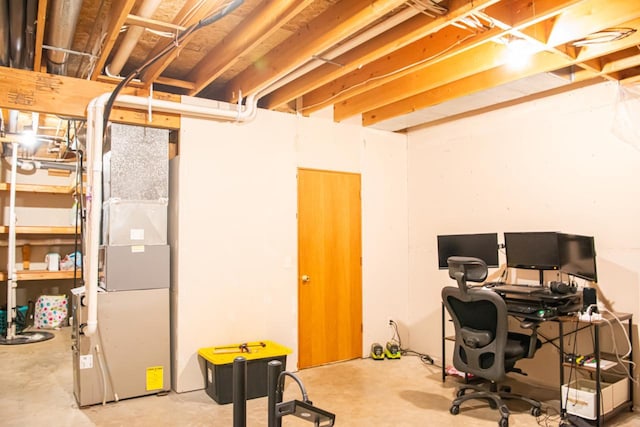 624 Westwynd Ct, Mazomanie, WI 53560 - home office featuring unfinished concrete flooring and heating unit