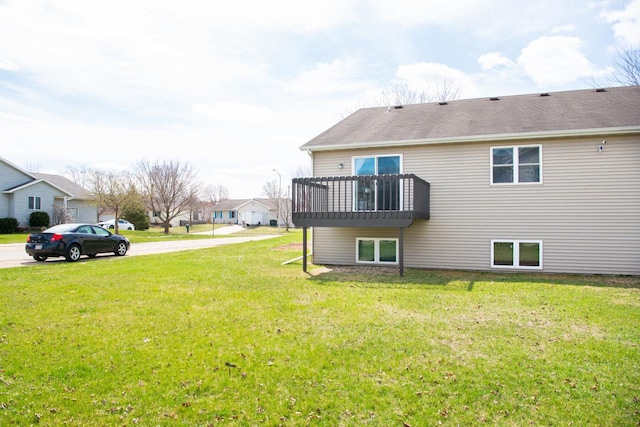 624 Westwynd Ct, Mazomanie, WI 53560 - back of house featuring a lawn and a shingled roof
