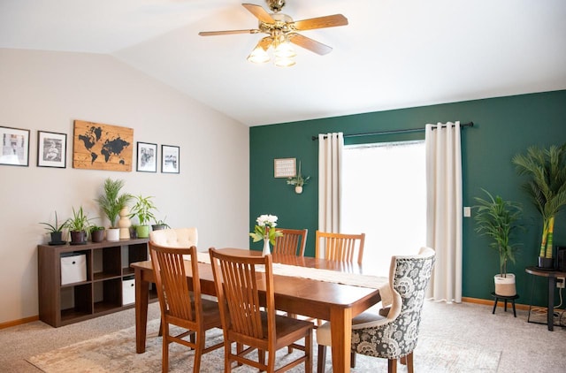 624 Westwynd Ct, Mazomanie, WI 53560 - dining area with lofted ceiling, a ceiling fan, baseboards, and light carpet