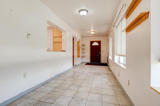 1600 26th Ave, Menominee, MI 49858 - foyer with light tile patterned floors and baseboards