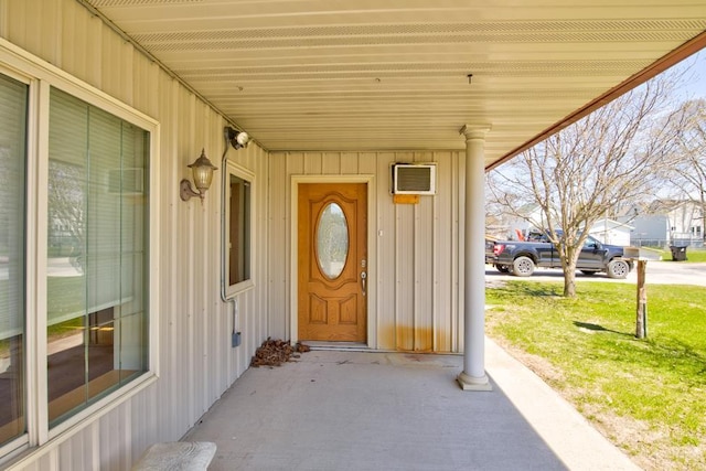 1600 26th Ave, Menominee, MI 49858 - view of exterior entry with a wall unit AC