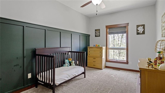 129 Grey Friar Ln, Eau Claire, WI 54701 - bedroom featuring light colored carpet, a ceiling fan, and baseboards