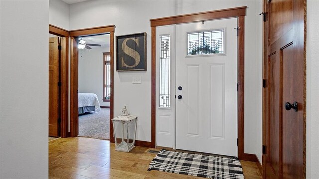 129 Grey Friar Ln, Eau Claire, WI 54701 - entrance foyer featuring light wood finished floors, baseboards, and a ceiling fan