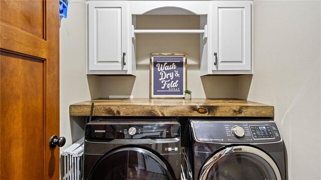 129 Grey Friar Ln, Eau Claire, WI 54701 - laundry room with independent washer and dryer and cabinet space