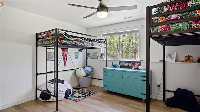 129 Grey Friar Ln, Eau Claire, WI 54701 - bedroom featuring wood finished floors, baseboards, and ceiling fan
